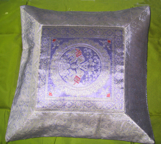 Purple cushion with 2 elephants in the center