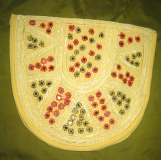 lemon colored bag with mirrors.